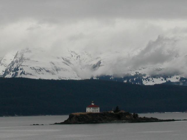 Light house and mountains along the ferry route