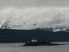 Light house and mountains along the ferry route